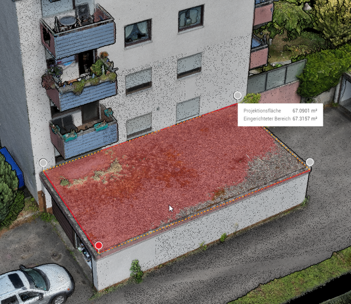Flächenmessung einer Garage aus der Punktewolke Drohnenbasierte Punktewolke einer Garage mit markierter und vermessener Flachdachfläche.